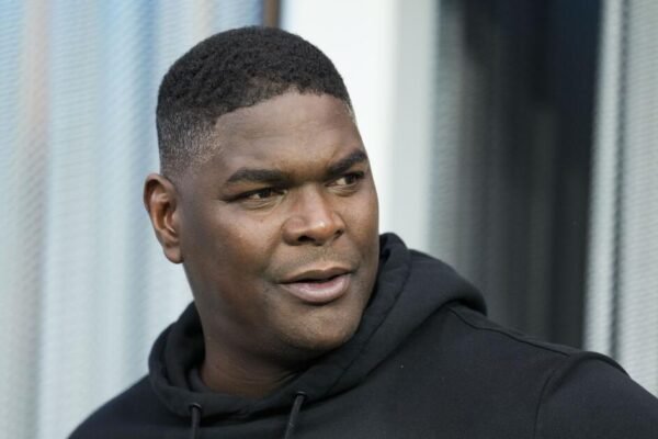 Keyshawn Johnson sues sports agent for almost $1 million Keyshawn Johnson sues sports agent for almost $1 million