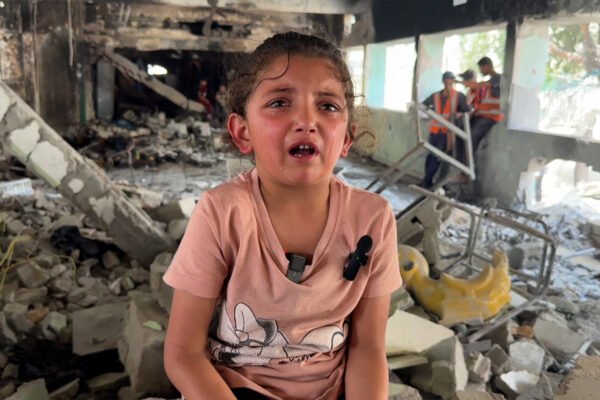 Silhouetted by fire, six-year-old girl survives Israeli attack in Gaza | Israel-Palestine conflict News Silhouetted by fire, six-year-old girl survives Israeli attack in Gaza | Israel-Palestine conflict News