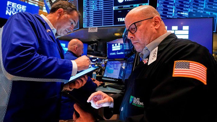 Traders on the floor of the New York Stock Exchange