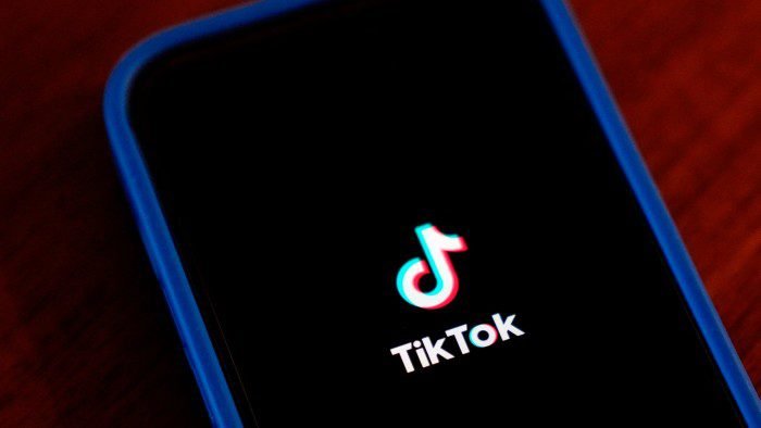 The TikTok app logo on an iPhone