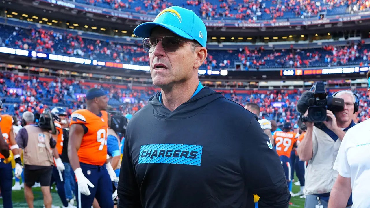 Jim Harbaugh added to lawsuit over former assistant coach's hacking scandal