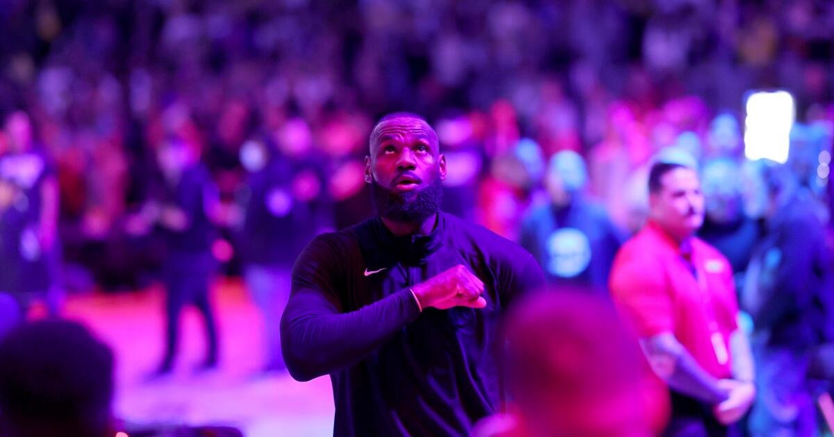 LeBron James exercises his player option, sets NBA record