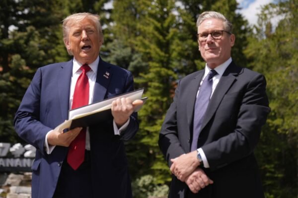 Trump, Starmer use G7 summit to finalize trade deal announced in May Trump, Starmer use G7 summit to finalize trade deal announced in May